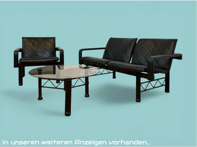 WMK # Stilvoller und sehr gut erhaltener Designer Couchtisch von Klöber aus 1996 mit runder Glasplatte 80cm auf schwarzem Metallgestell