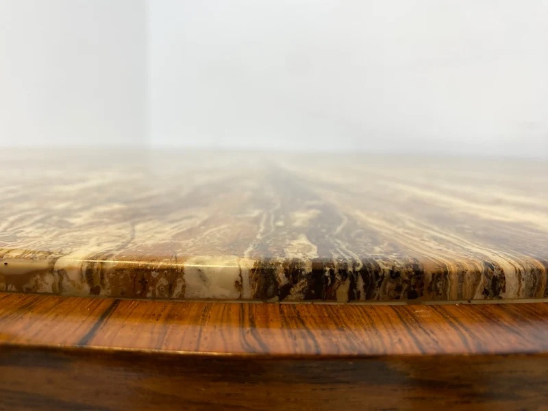 WMK Sehr gut erhaltener runder Mid-Century Designercouchtisch in skandinavischem Design von Berthold Müller mit schöner Natursteinplatte & Holzgstell aus Palisander