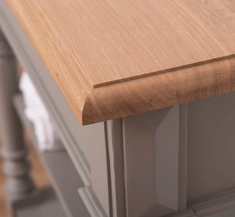Waschbeckenunterschrank aus Massivholz mit gedrehten Beinen