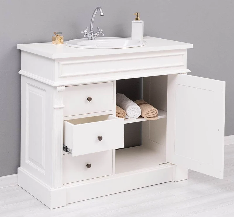 Waschbeckenunterschrank aus Massivholz mit drei Schubladen