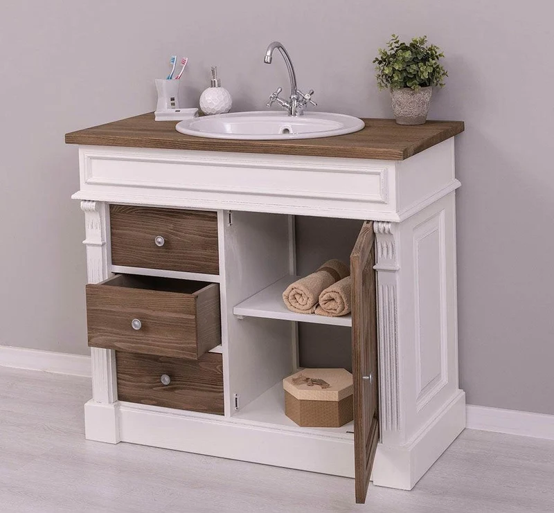 Waschbeckenunterschrank aus Massivholz mit drei Schubladen